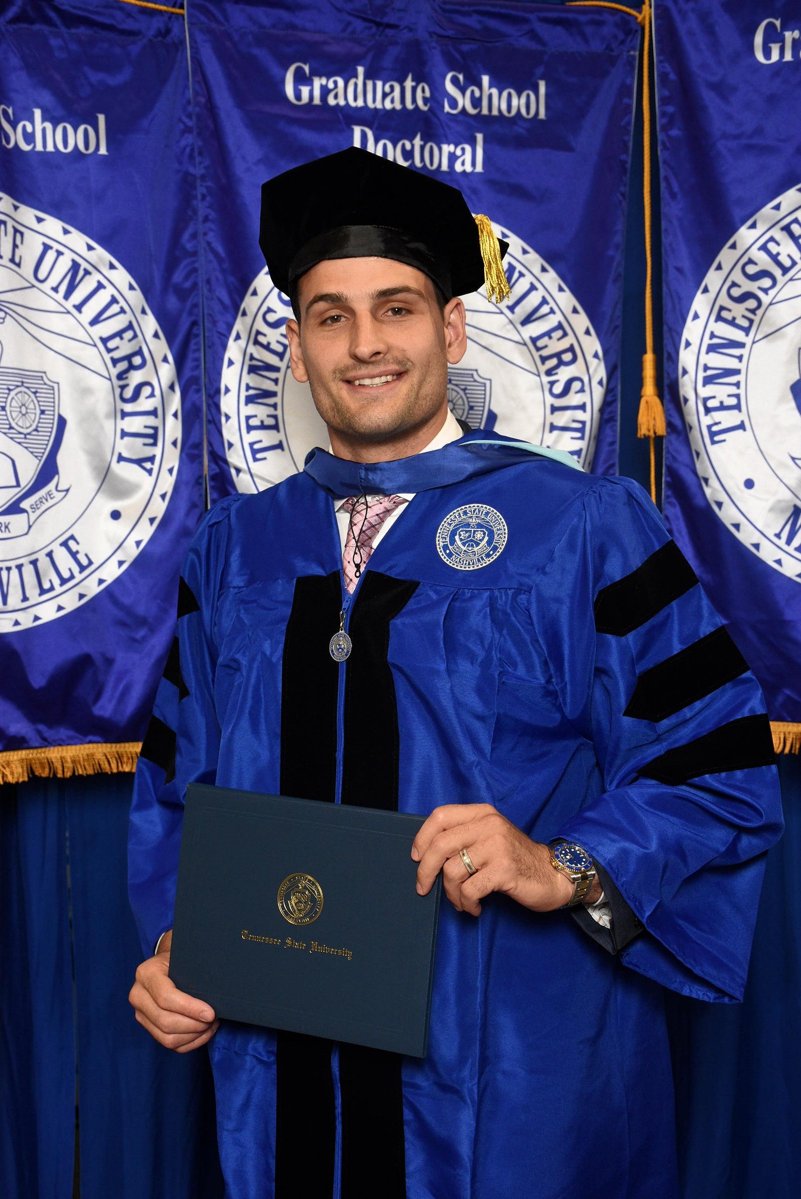 Korab Idrizi in doctoral regalia